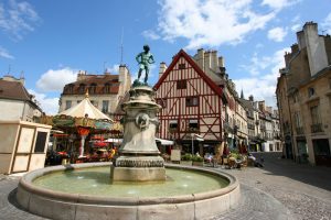 Famous,Fountain,,Characteristic,Houses,And,Colorful,Carousel,In,Dijon,,Burgundy,