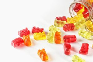Gummies,On,An,Isolated,Background,In,A,Glass,Container